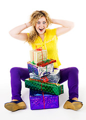 Image showing Shoced woman with presents