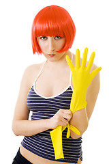 Image showing woman in red wig and yellow gloves