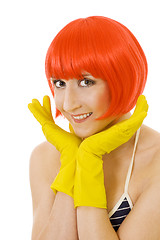 Image showing woman in red wig and yellow gloves