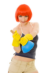 Image showing Woman wearing red wig with blue plunger