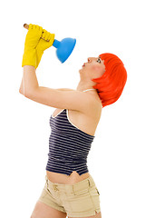 Image showing Shocked woman with cleaning tool