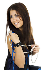 Image showing Woman with beads