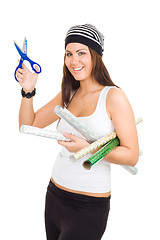 Image showing Woman holding scissors and package paper