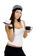 Image showing woman with black and white cups