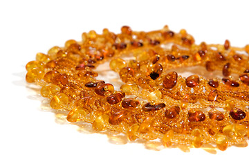 Image showing Amber necklace on white background