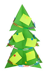 Image showing isolated Cardboard Christmas tree, decorated with stationery. 