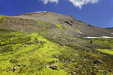 Image showing Hiker climbing an unspoiled mountain side