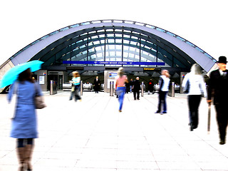 Image showing People walking to the tube station, London