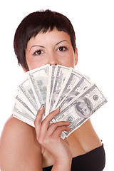 Image showing Attractive woman takes lot of 100 dollar bills