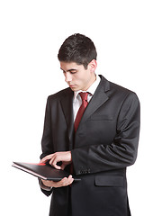 Image showing Confident businessman with notebook