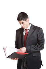 Image showing Confident businessman with notebook