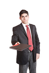 Image showing Confident businessman with notebook