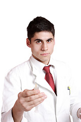 Image showing doctor holding syringe