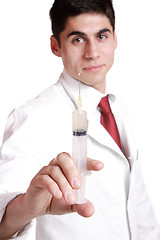 Image showing doctor holding syringe