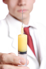 Image showing doctor holding syringe