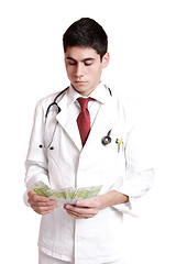 Image showing Doctor with 100 dollars bills 