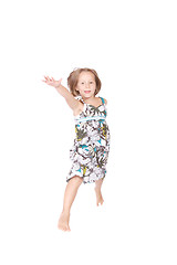 Image showing Little girl jumps 