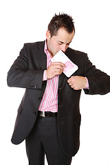 Image showing Portrait of a business man holding money 