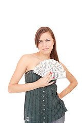 Image showing Attractive woman takes lot of 100 dollar bills