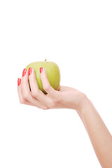 Image showing Fresh green apple in hand 