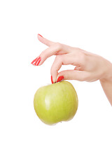 Image showing Fresh green apple in hand 