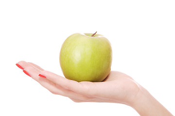 Image showing Fresh green apple in hand 