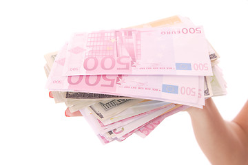 Image showing Female hand holding Euro and Dollars bills