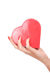 Image showing Woman holding red heart in the hand