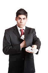 Image showing Businessman Holding Money