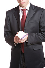 Image showing Businessman Holding Money