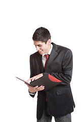 Image showing Confident businessman with notebook