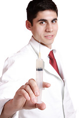 Image showing doctor holding syringe