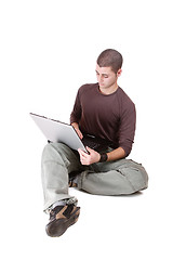 Image showing relaxed man with laptop