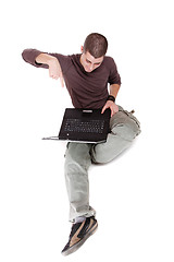 Image showing relaxed man with laptop