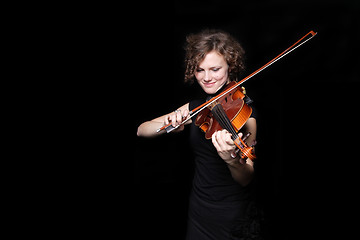 Image showing Young woman playing violin