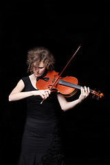 Image showing Young woman playing violin