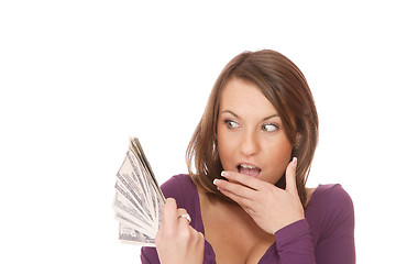 Image showing Attractive woman takes lot of 100 dollar bills
