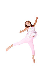Image showing Little girl jumps 