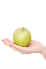 Image showing Fresh green apple in hand 