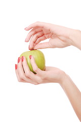 Image showing Fresh green apple in hand 