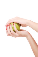 Image showing Fresh green apple in hand 