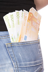 Image showing Happy woman with group of euro bills Isolated.