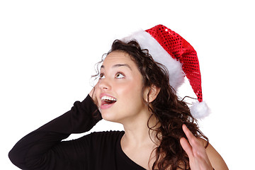 Image showing young woman wearing christmas hat