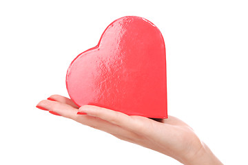 Image showing Woman holding red heart in the hand