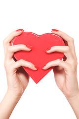 Image showing Woman holding red heart in the hand