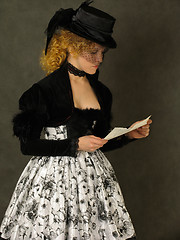 Image showing Lady reading the letter