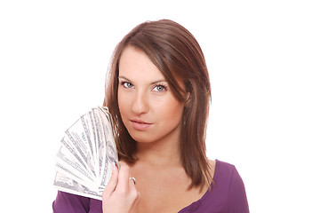 Image showing Attractive woman takes lot of 100 dollar bills