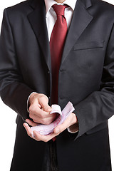 Image showing Portrait of a business man holding money 