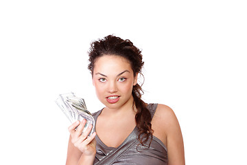 Image showing Attractive woman takes lot of 100 dollar bills