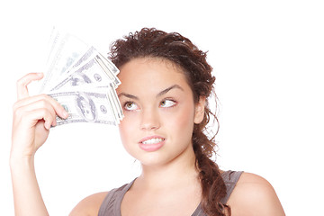 Image showing Attractive woman takes lot of 100 dollar bills